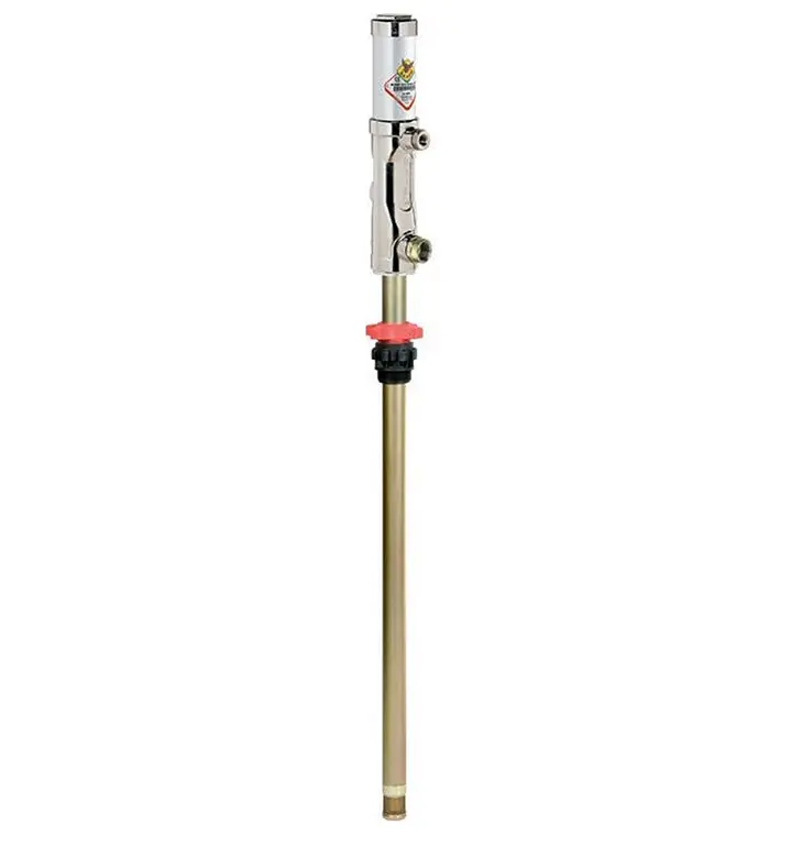 A gold pole with a red handle and some white stuff