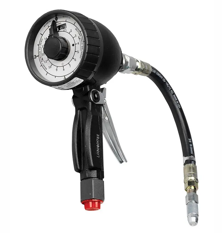 A tire inflator with a hose and gauge.