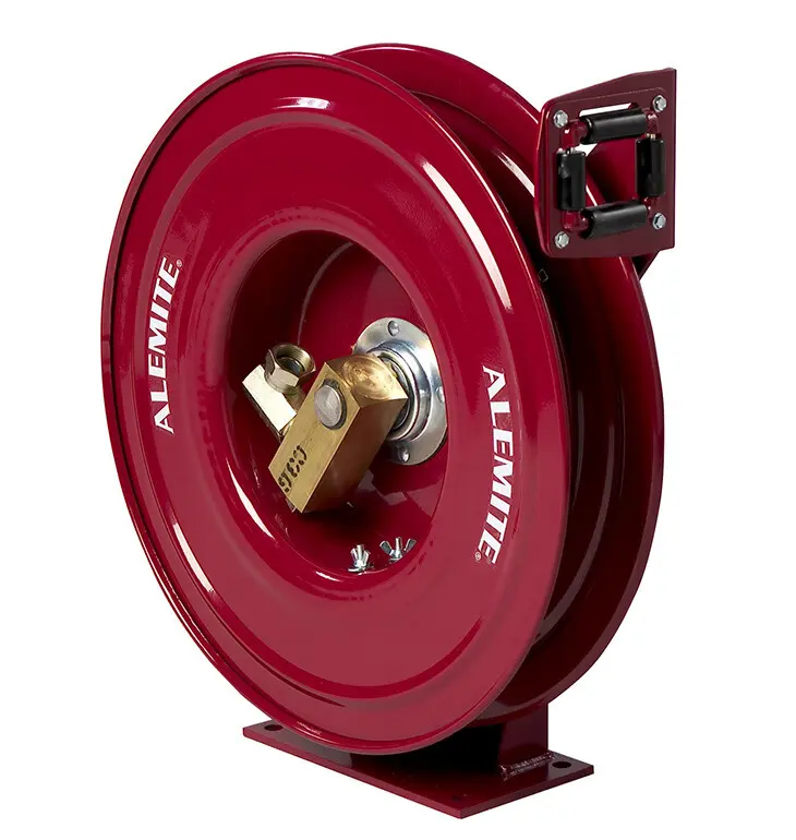 A red hose reel with the handle on it.