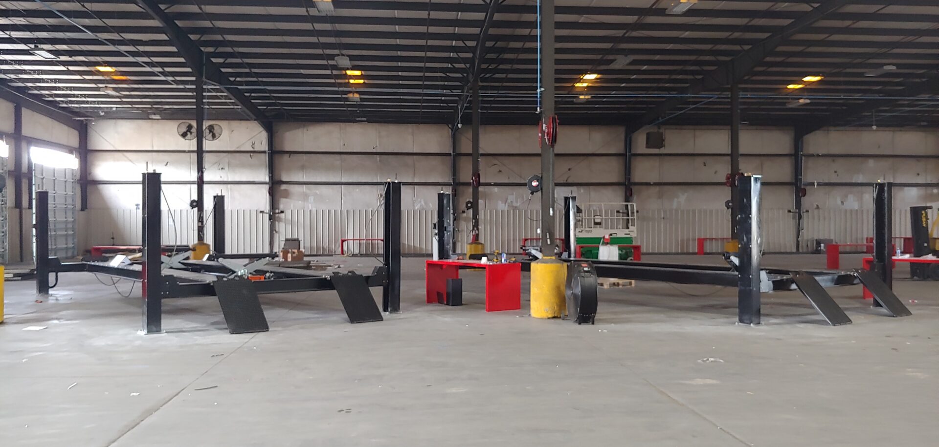 A large warehouse with many different types of equipment.