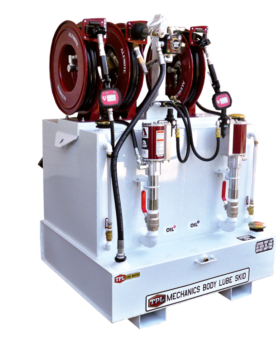 White square lube skid with three burgundy hose reels on top and two oil pumps mounted on the front side.