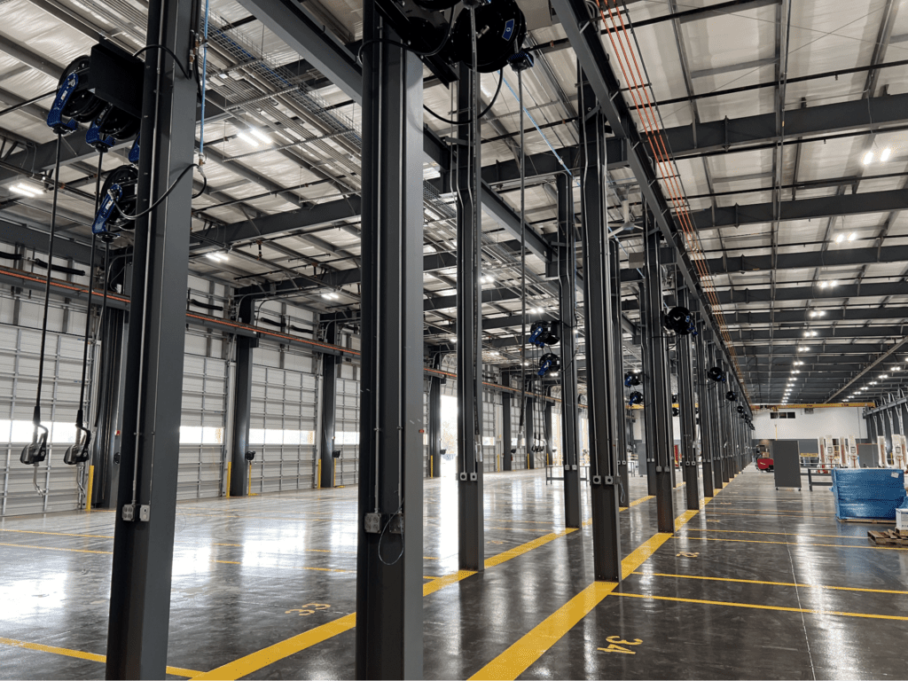 Large fleet maintenance shop with multi-bay layout designed for faster fluid management, lubricant dispensing systems, and efficient shop workflow.